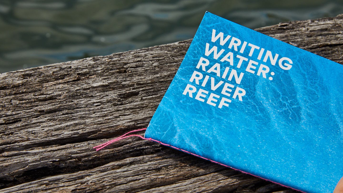 Writing Water-Sydney Ferry-wood dock background-Red Room Poetry