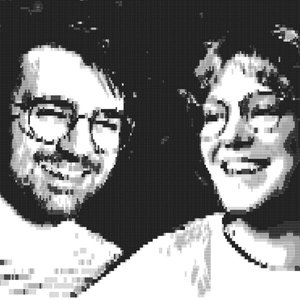 A pixelated black-and-white image of two poets, both wearing glasses and smiling.